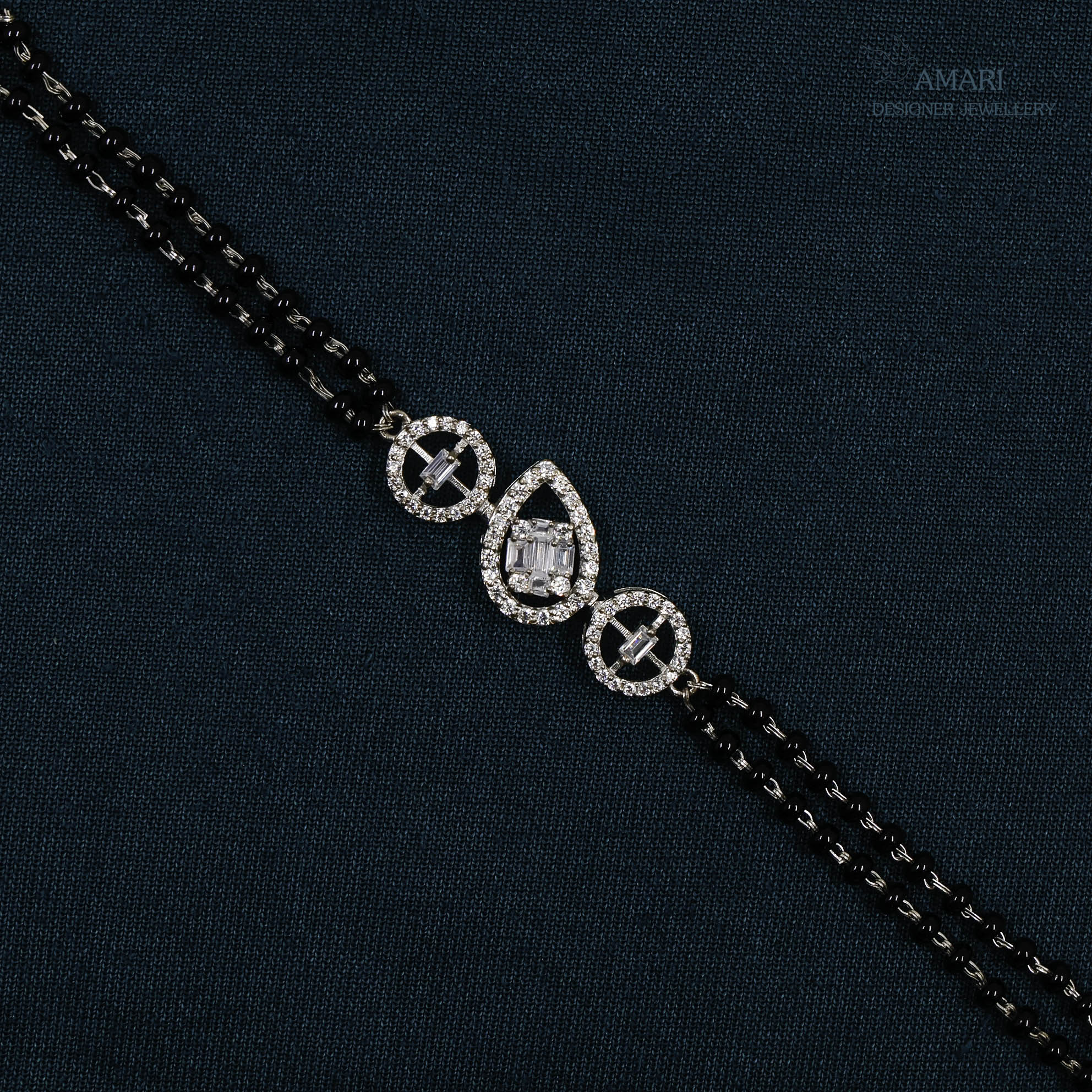 Elegant And Versatile Silver Hand Mangal Sutra Bracelet -