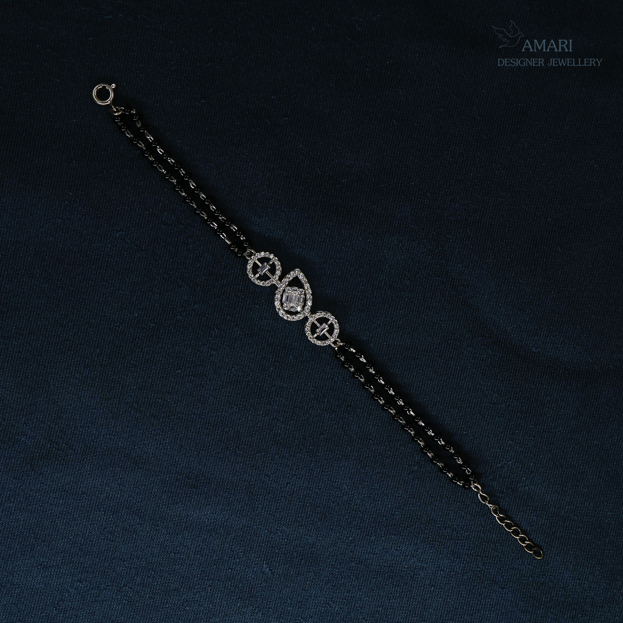 Elegant And Versatile Silver Hand Mangal Sutra Bracelet -
