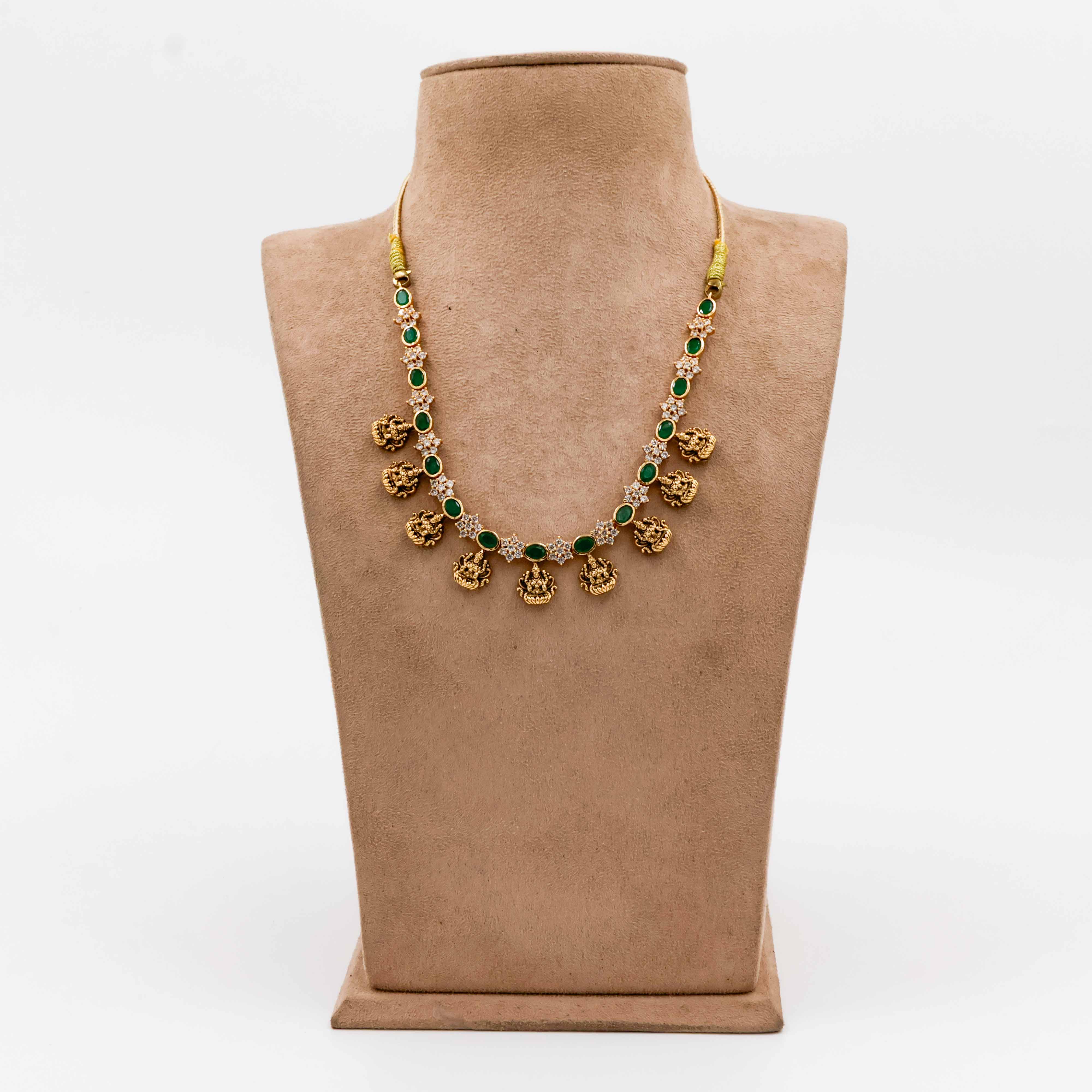 Temple Necklace with Green Stones and Lakshmi Motifs - 