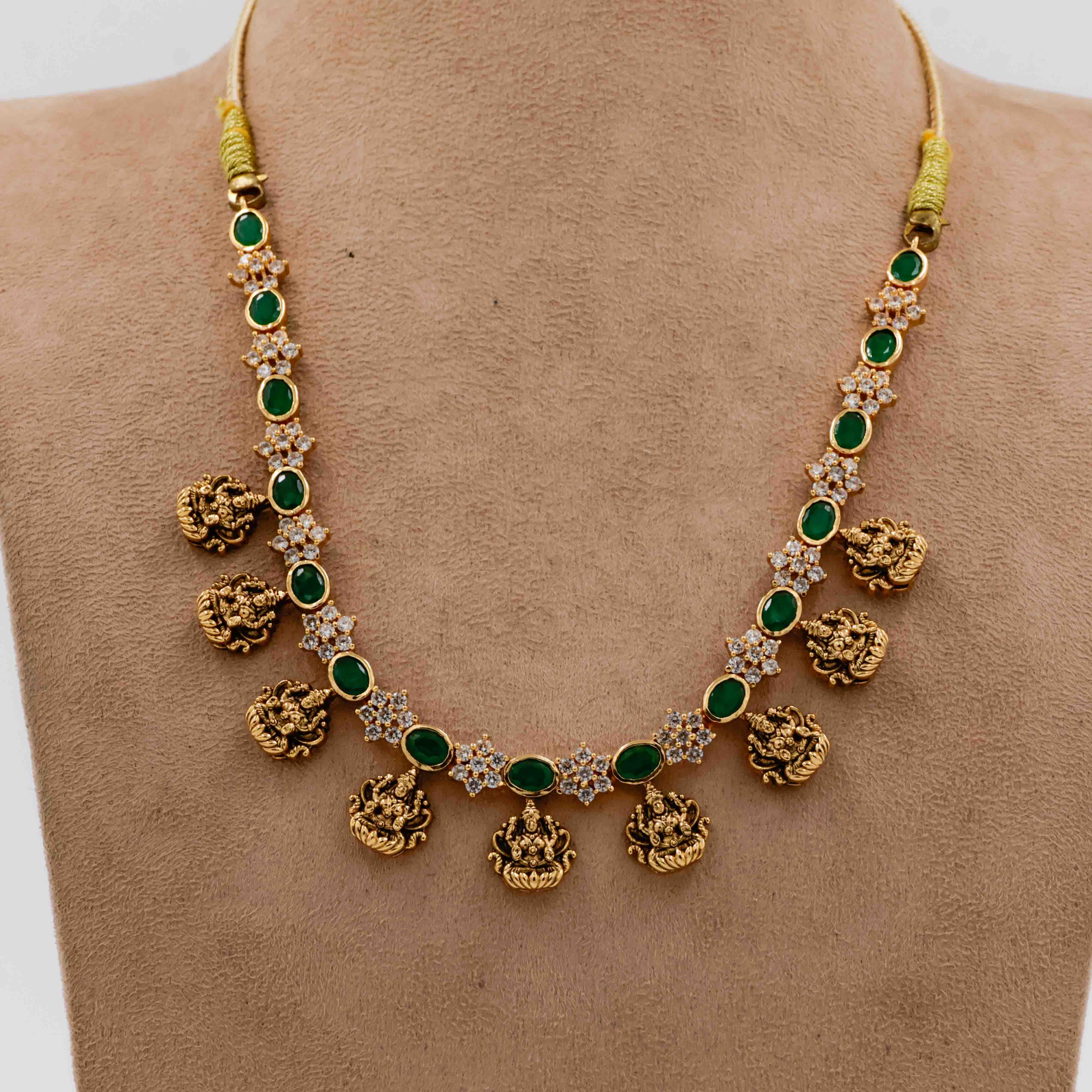 Temple Necklace with Green Stones and Lakshmi Motifs - 