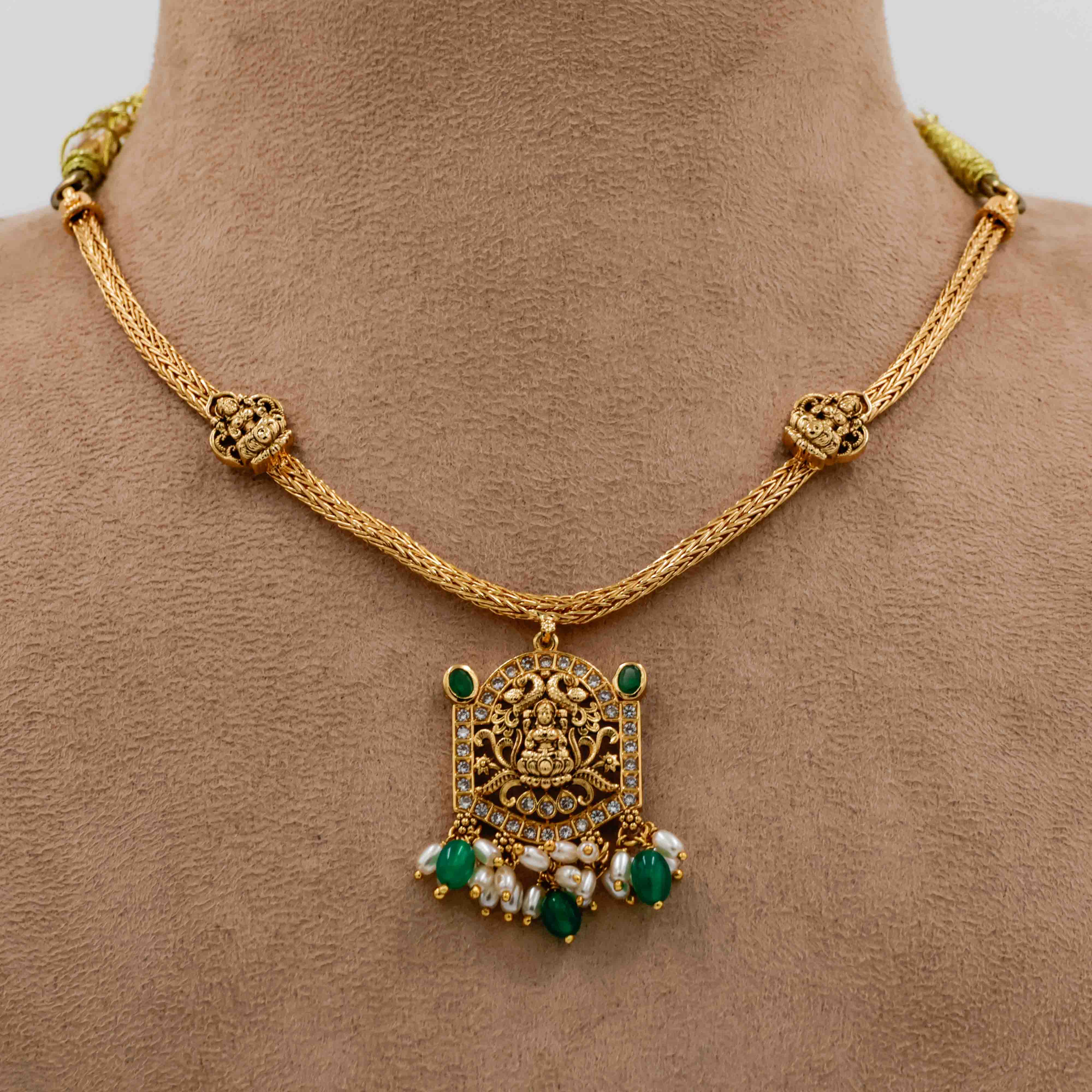 Temple Necklace with Green Stones and Lakshmi Motifs - 