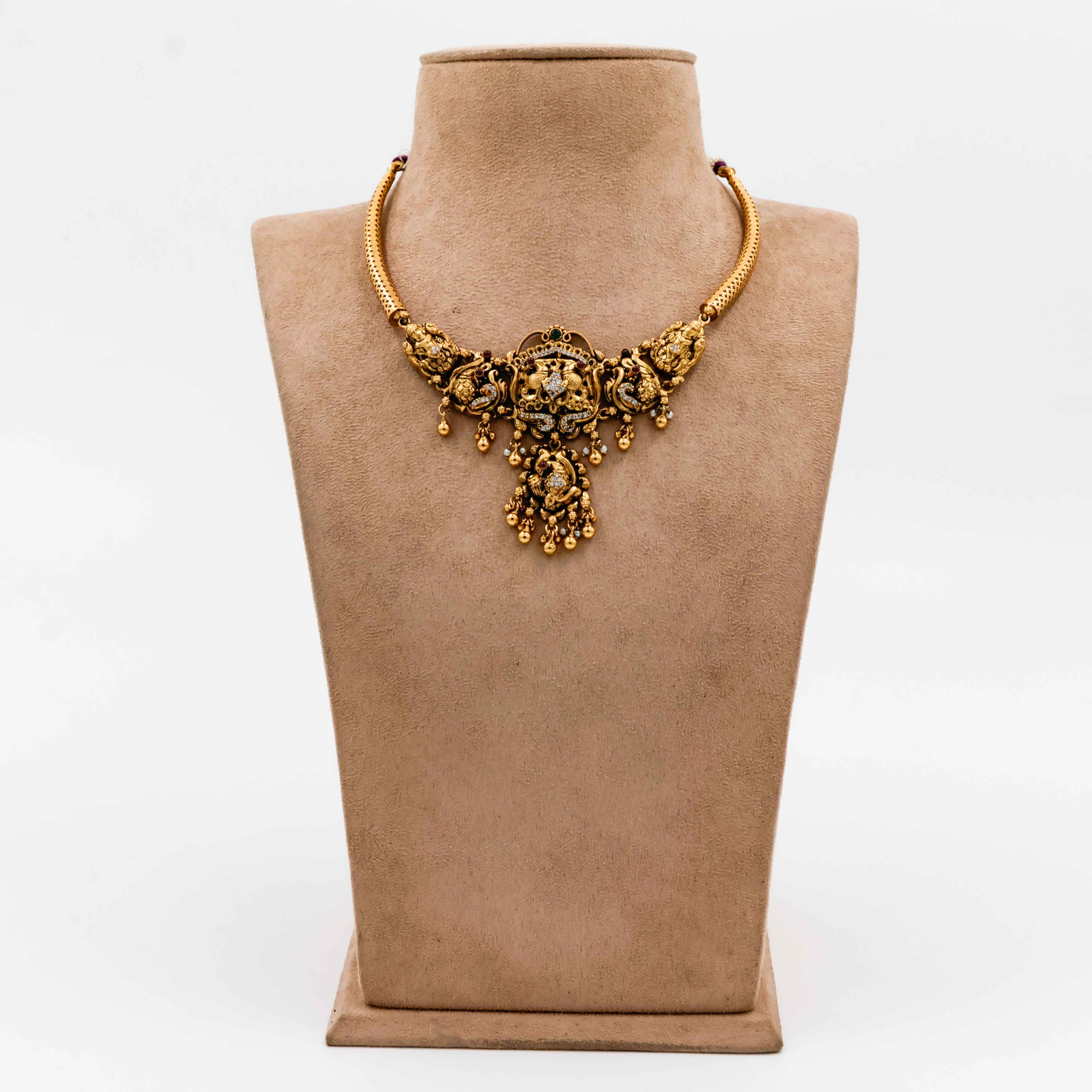 Temple Necklace with Red Stones Lakshmi Motifs and Pearl Drops - 