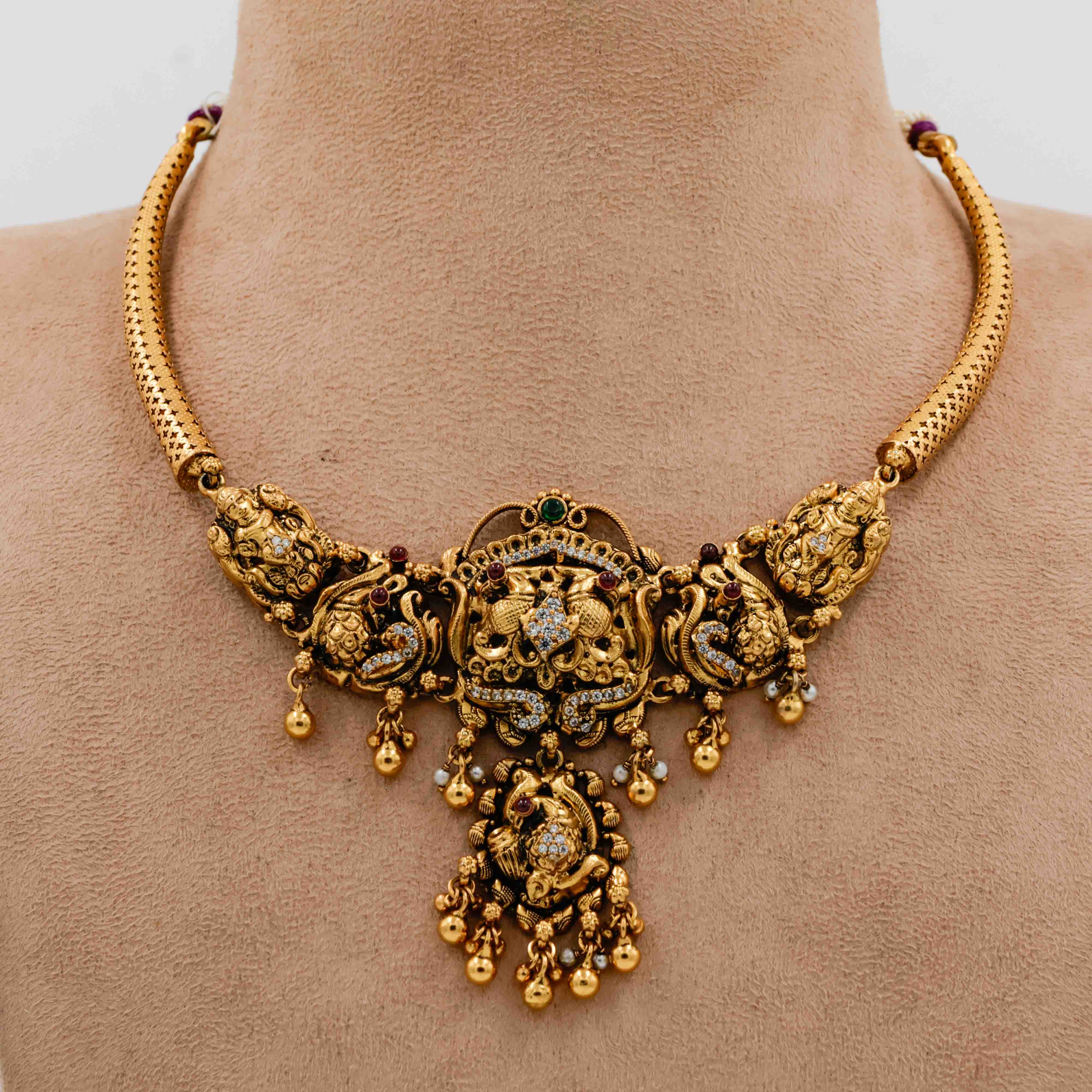 Temple Necklace with Red Stones Lakshmi Motifs and Pearl Drops - 