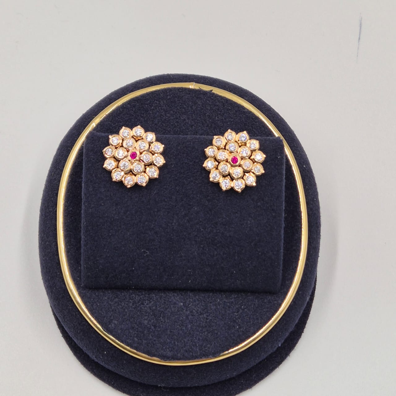 Floral Ruby Accent Stud Earrings