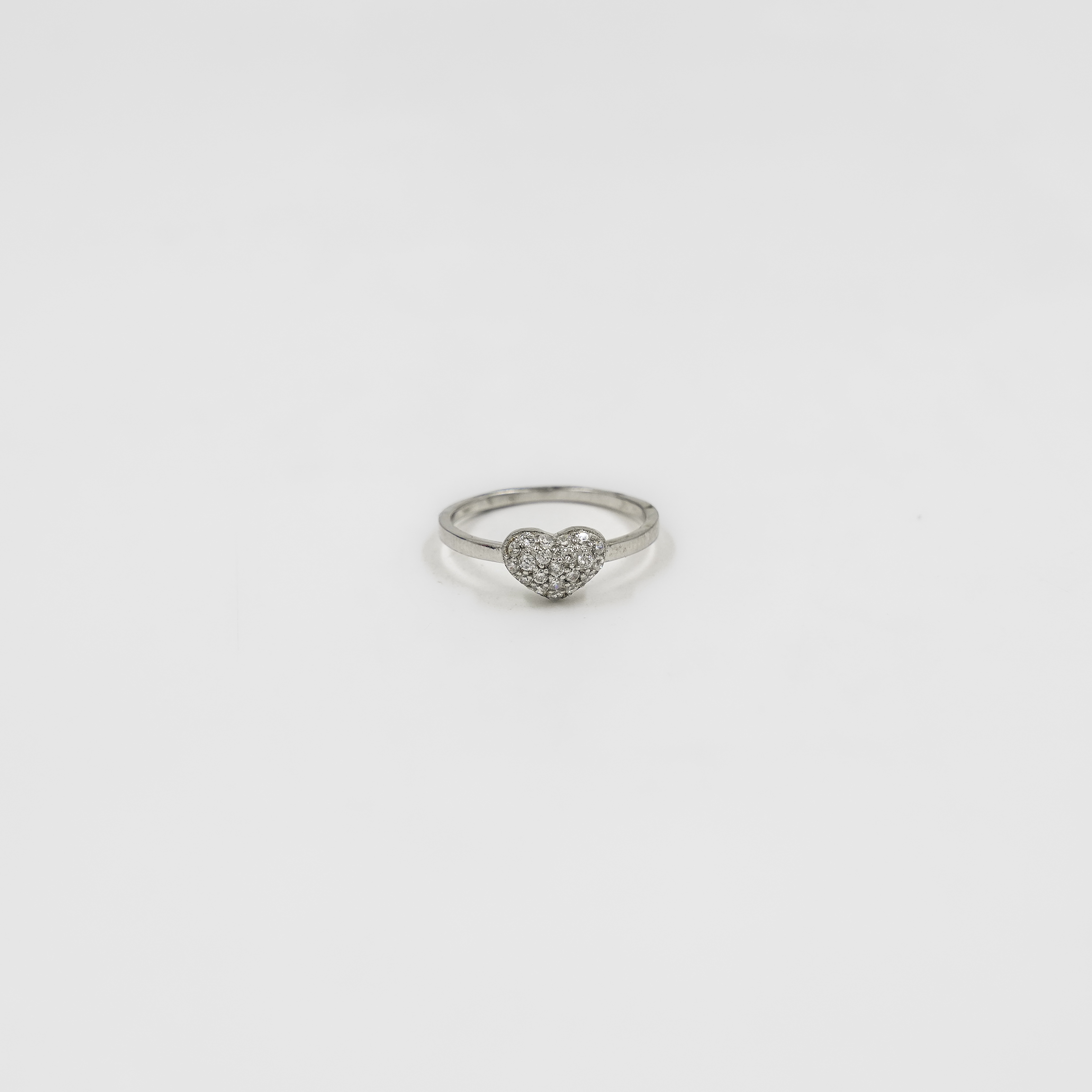 Sparkling Silver Heart-Shaped Ring Studded With