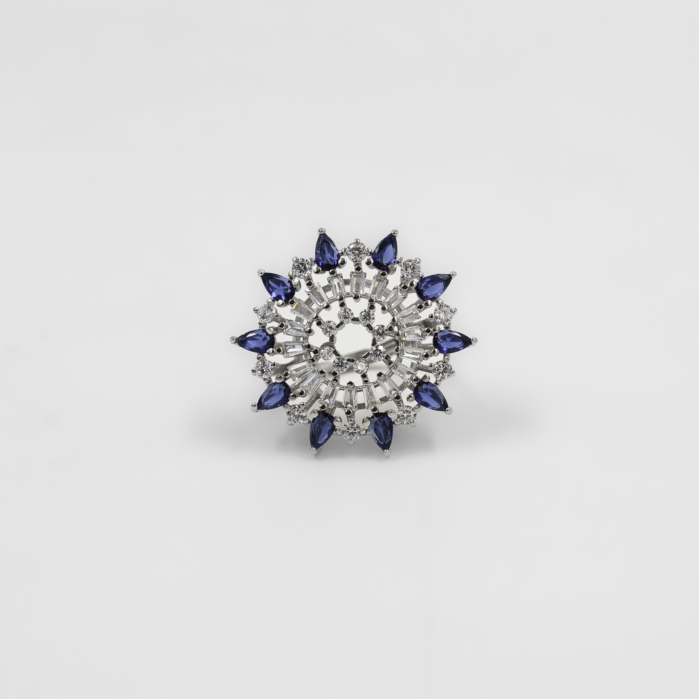 Elegant Silver Ring Adorned With Blue