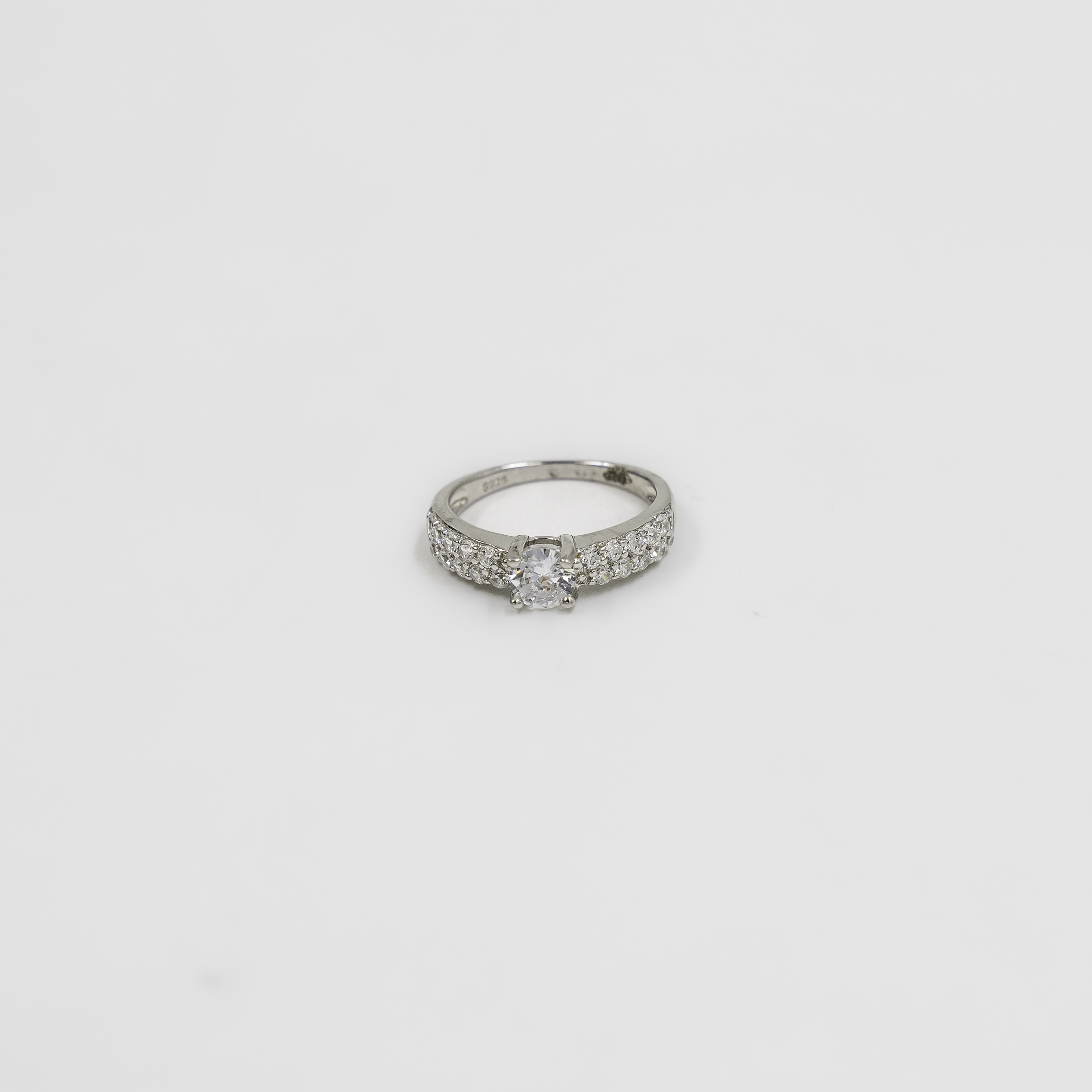 Elegant Silver Round Cut White Stone