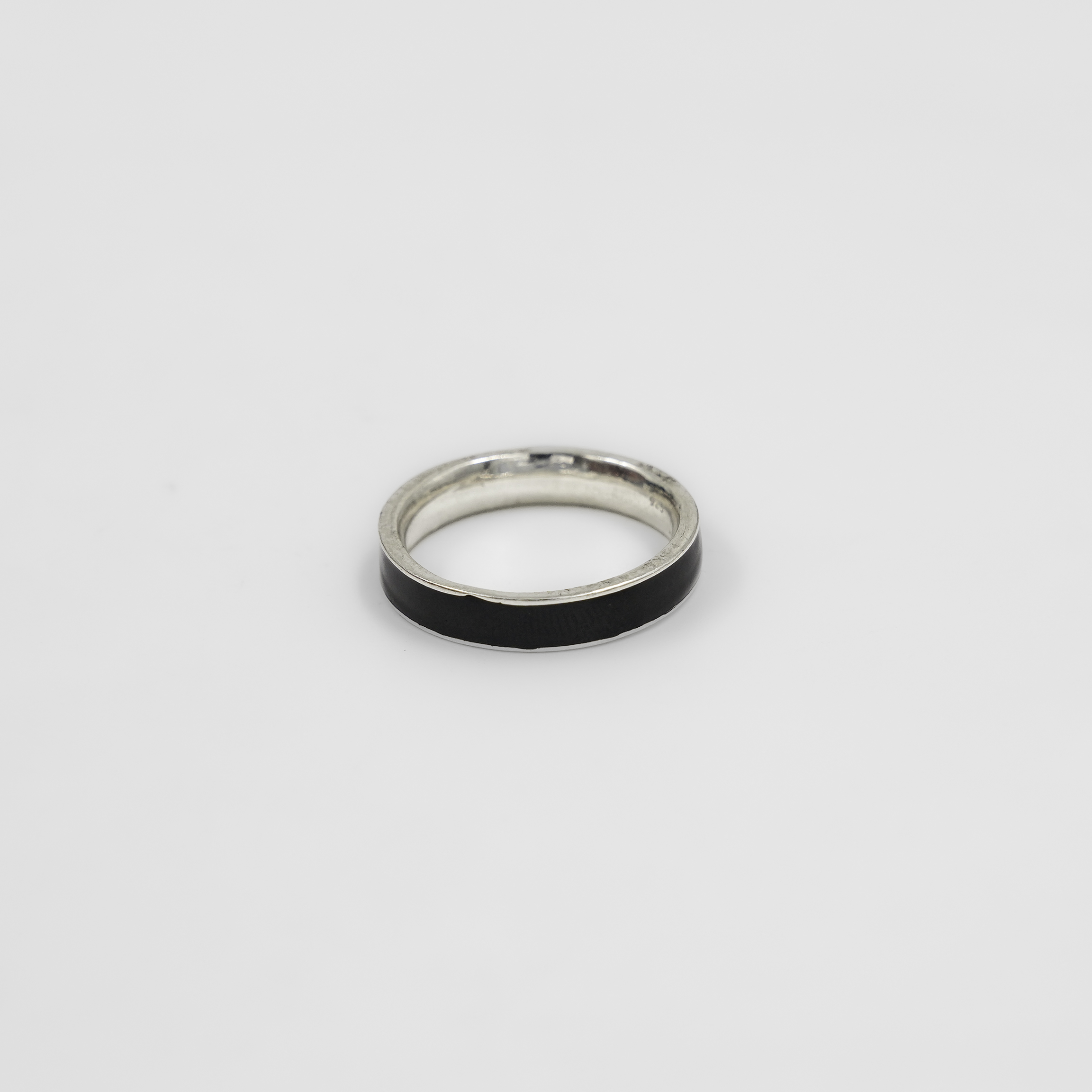 Elegant Silver Ring With Black Resin