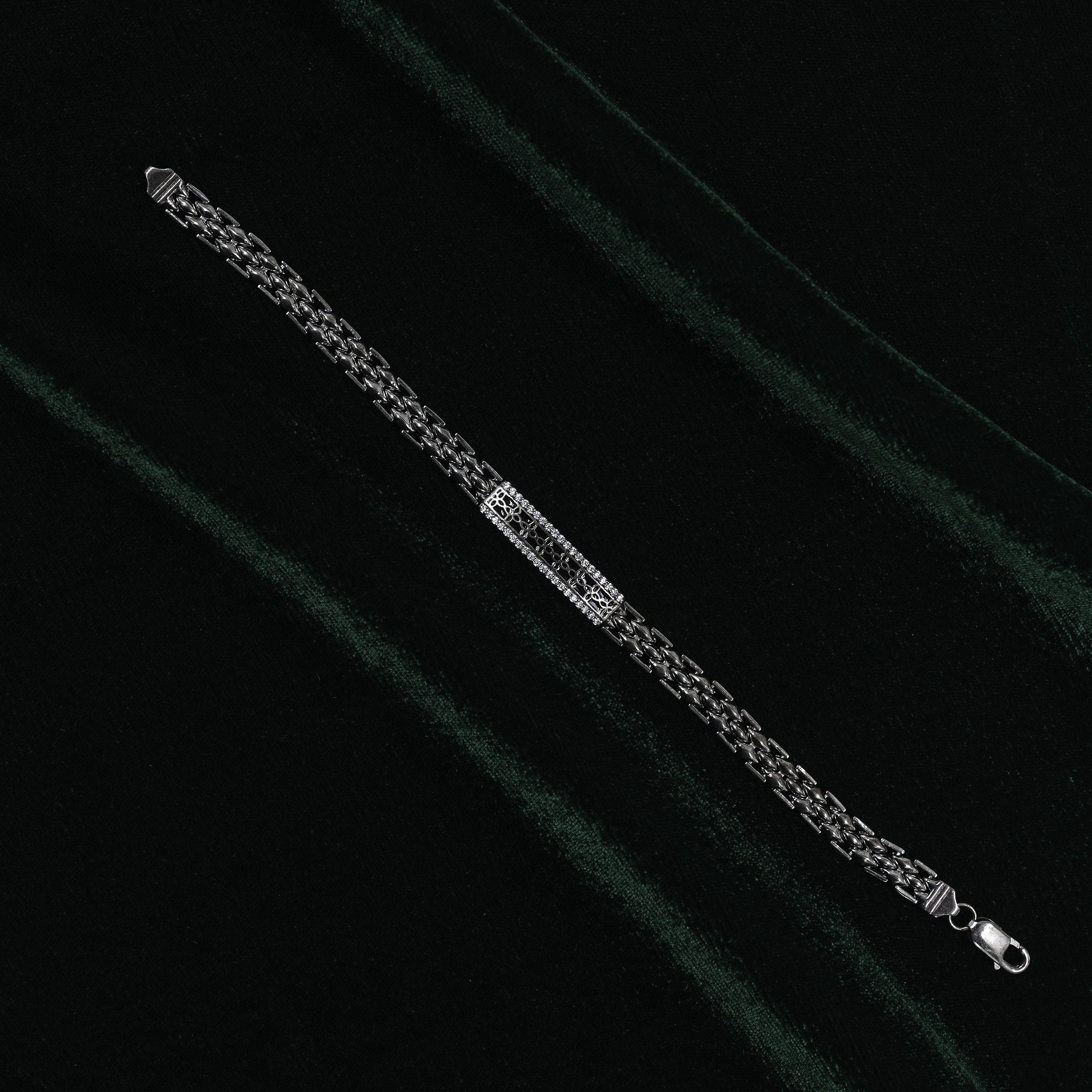 Silver Braided Bracelet With Embellished Centrepiece