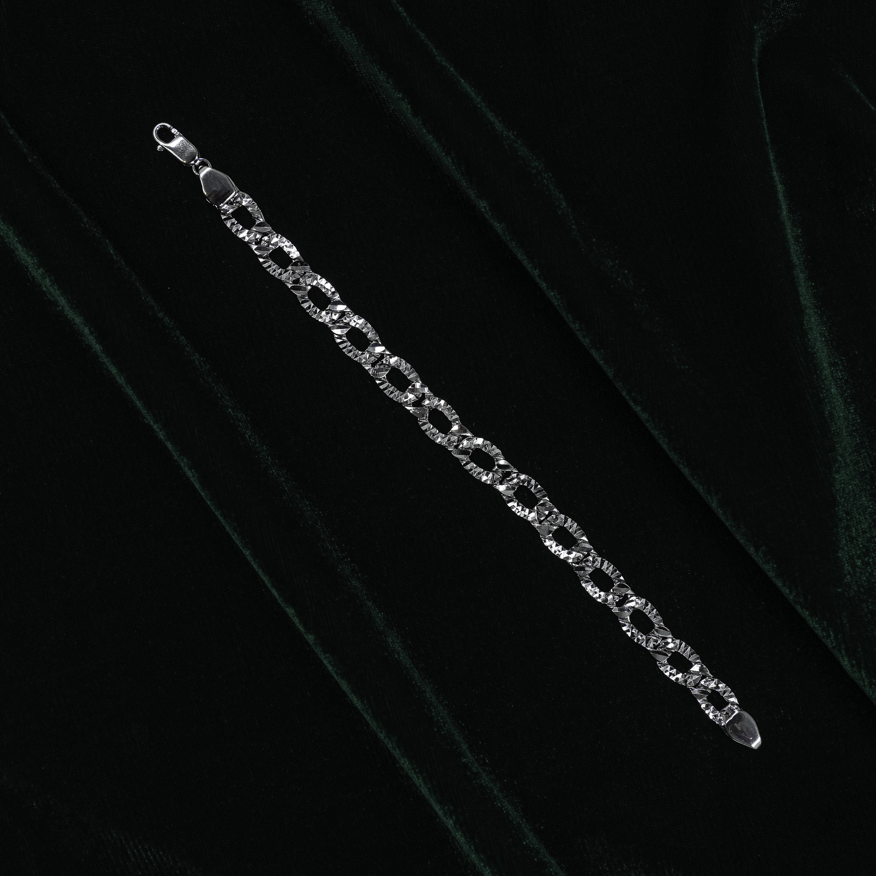 Elegant Sterling Silver Diamond Cut Oval