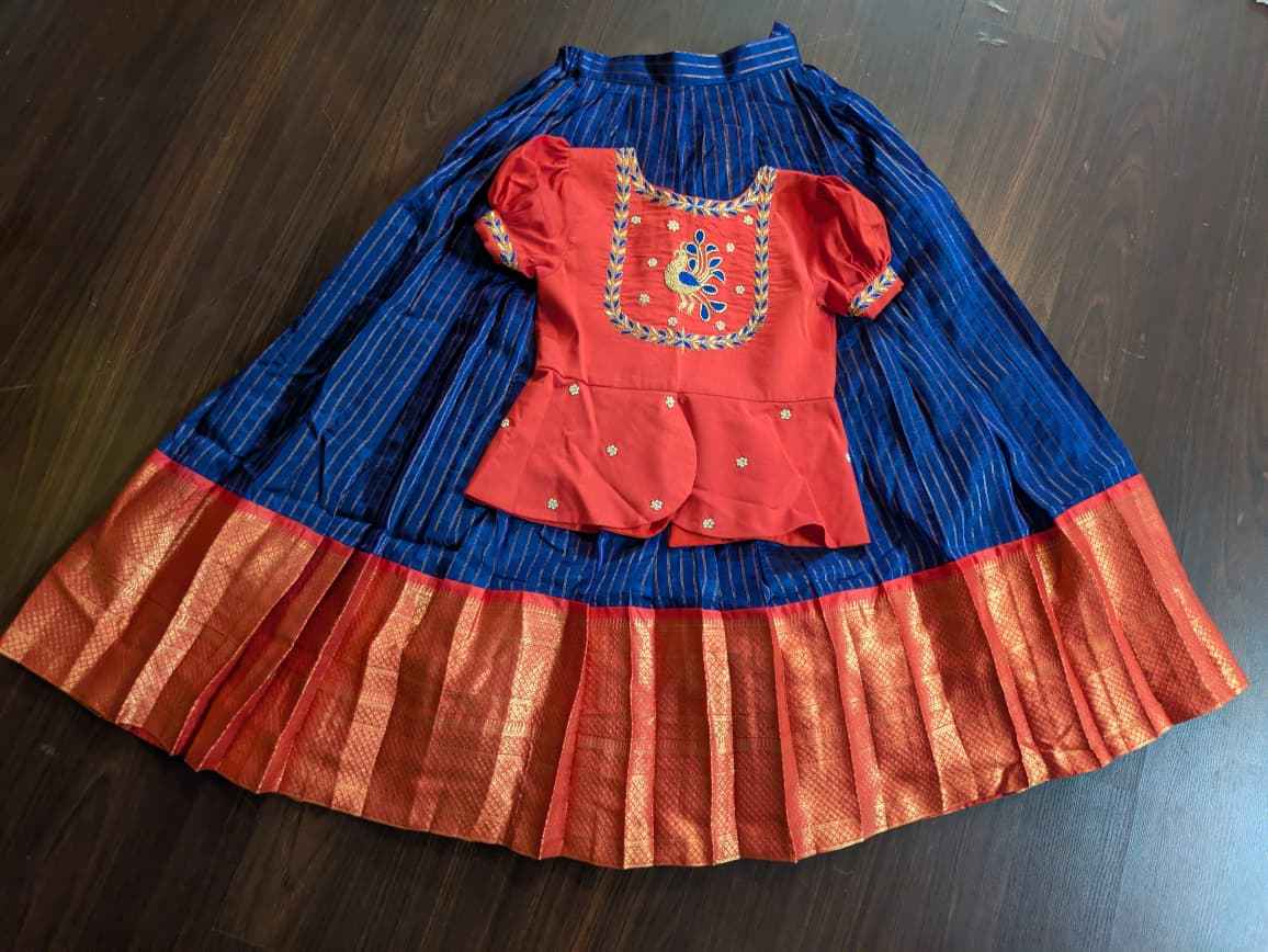 Beautiful mangalgiri lehenga with red peplum blouse