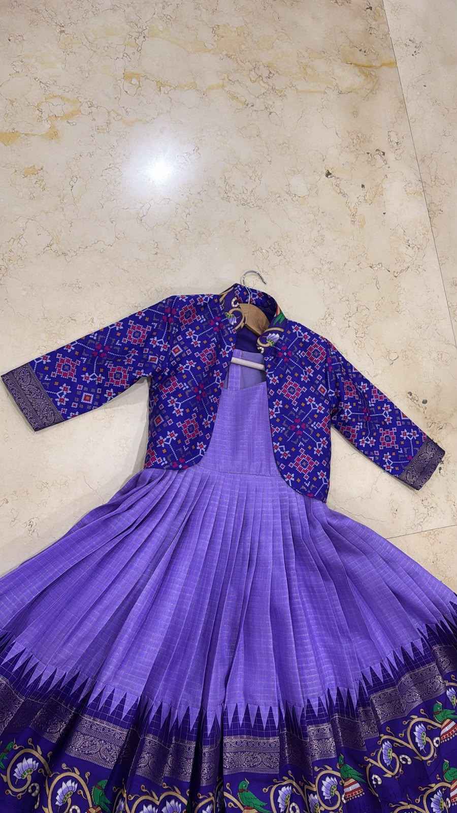 Patola styled kids frock with tanjore border