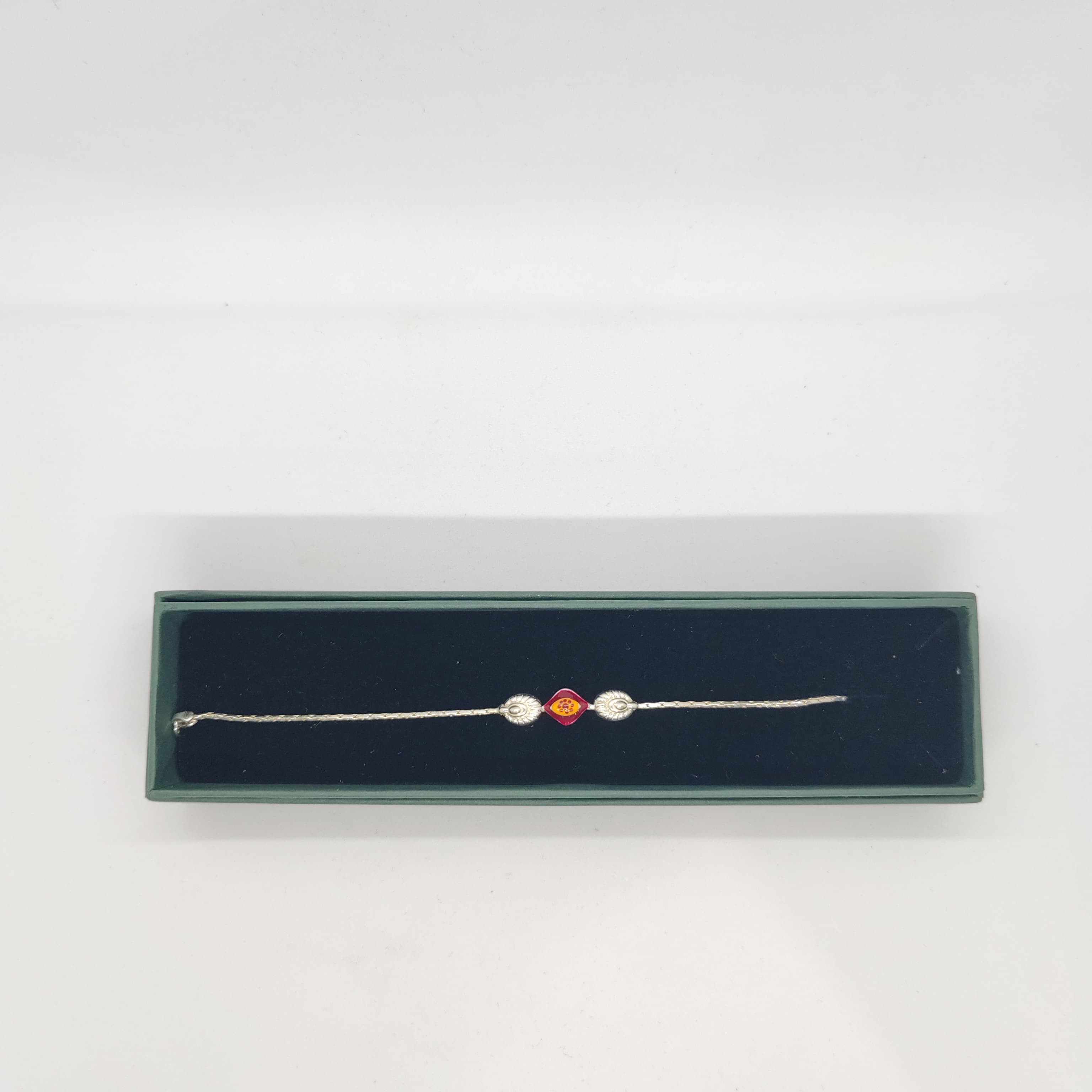 Simple and Elegant Silver Rakhi - Silver Rakhi