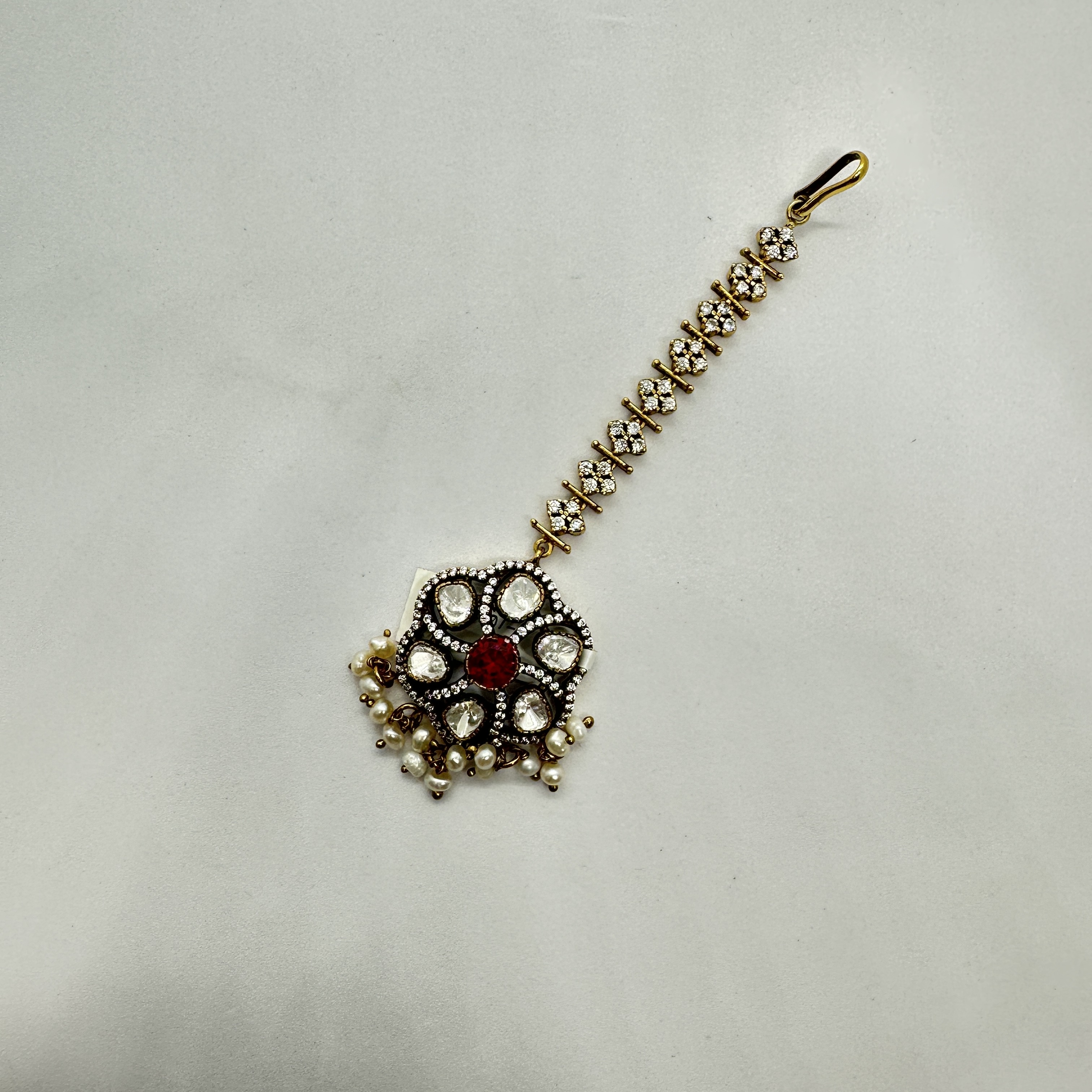 Gold Polish Silver Maang Tikka with Red Stone and White Kundan