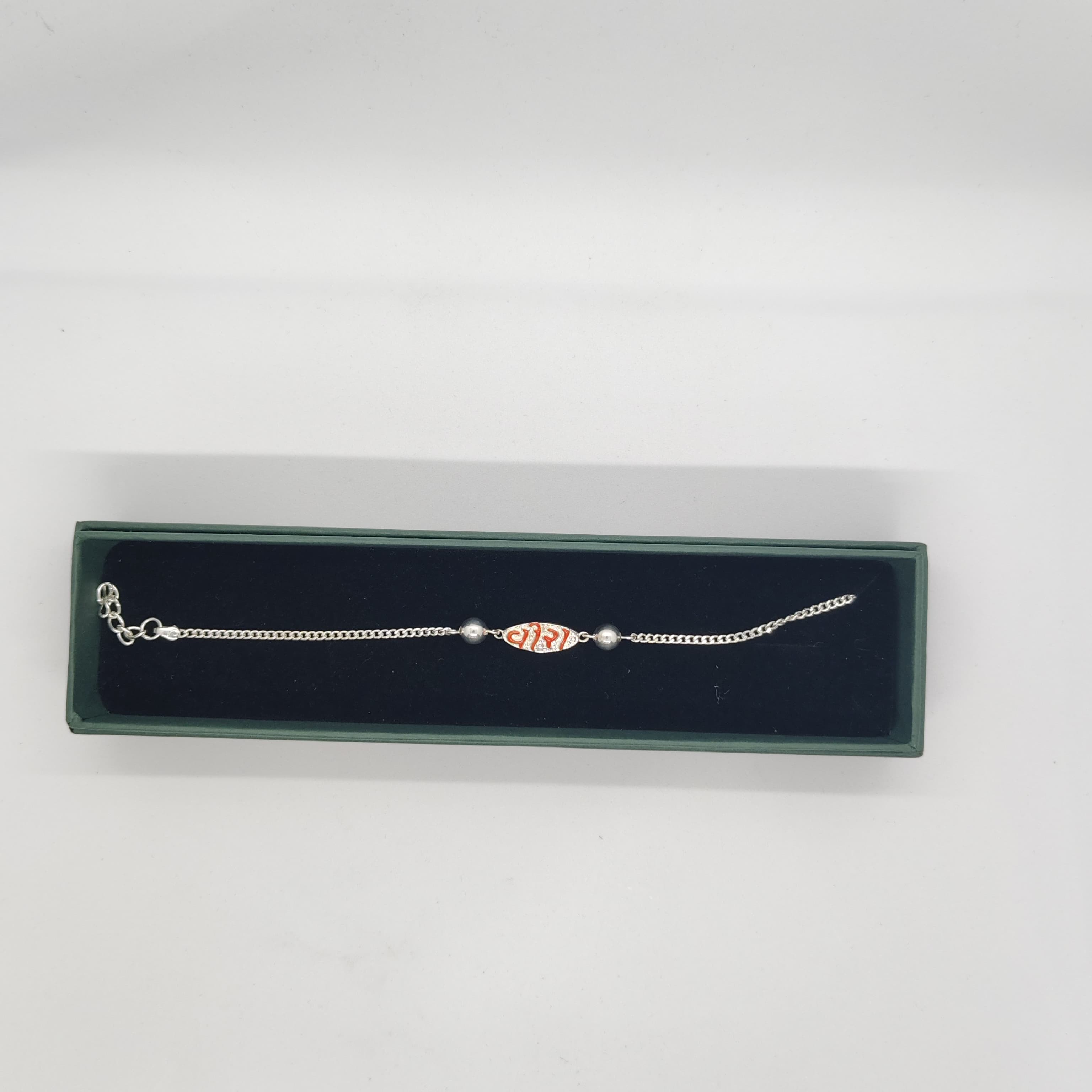 Veera Silver Rakhi  with Silver Stones and Beads - Silver Rakhi