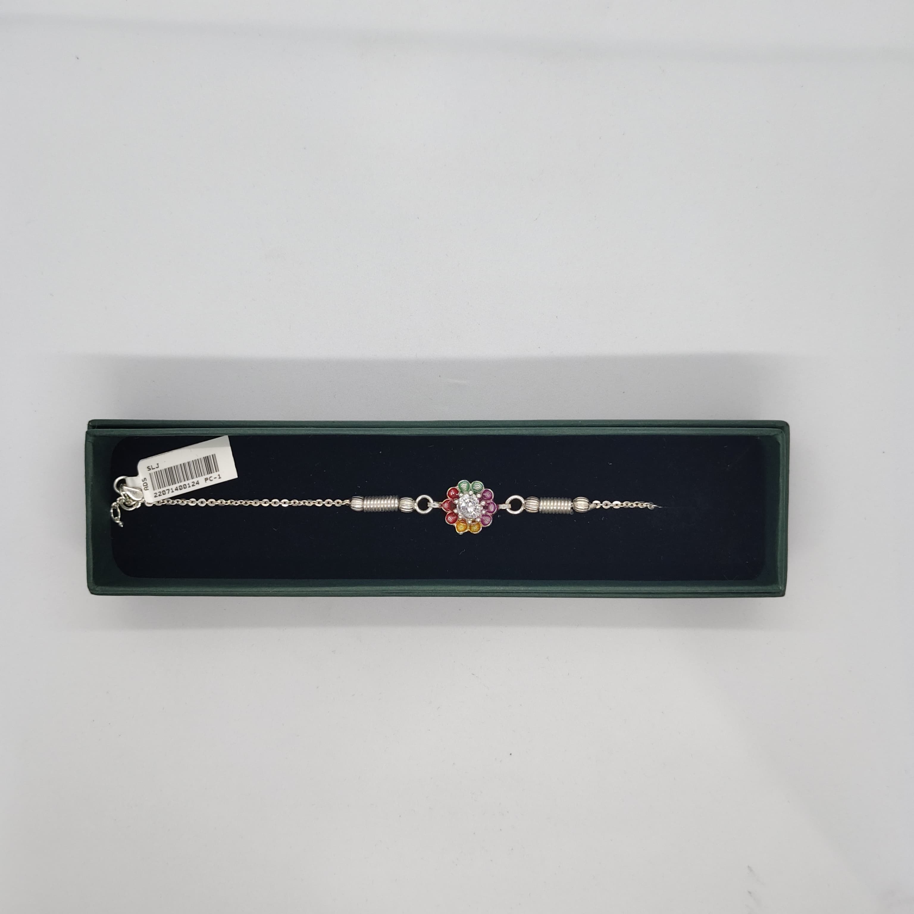 Colorful Silver Floral Rakhi - Silver Rakhi