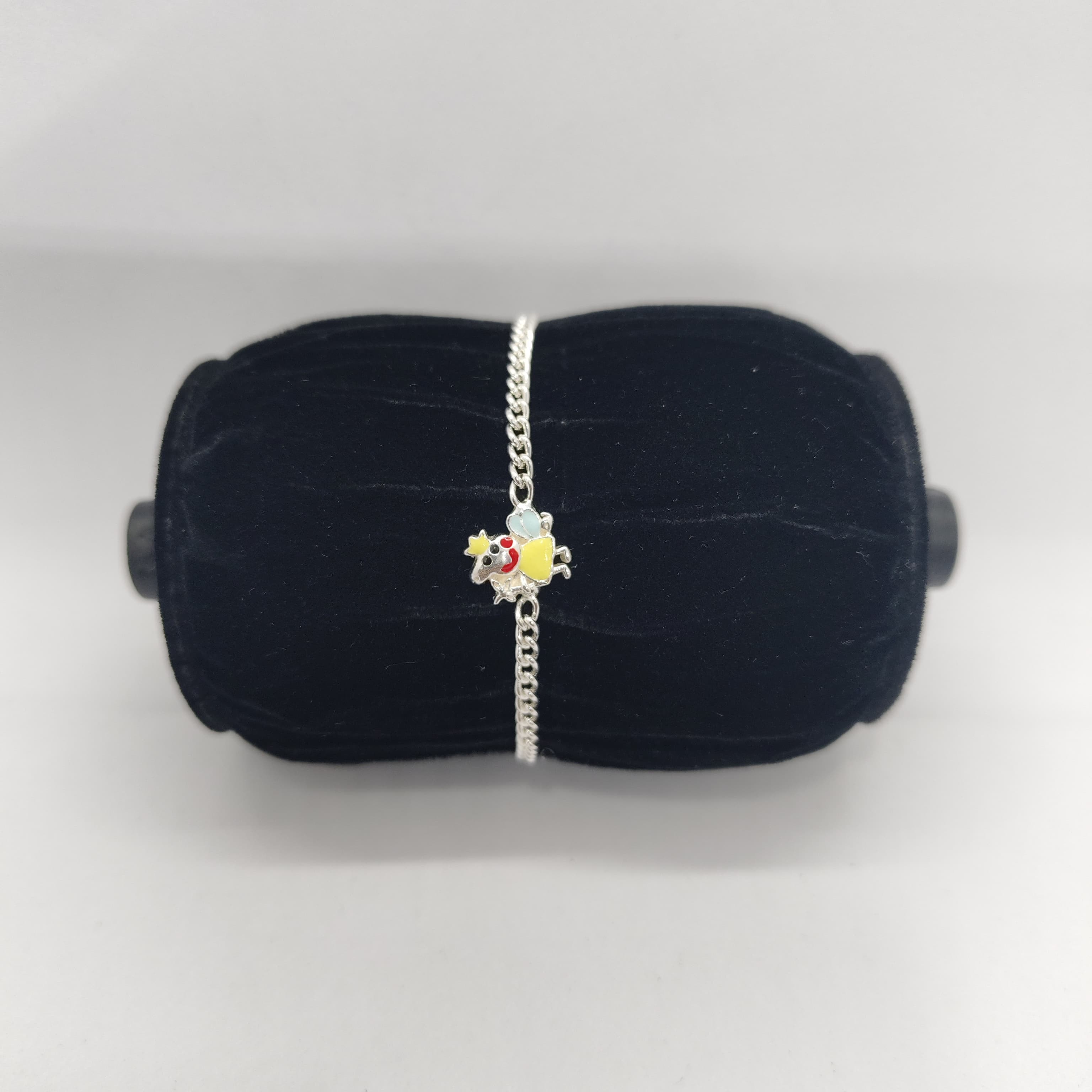Silver Yellow Cartoon Rakhi - Silver Rakhi