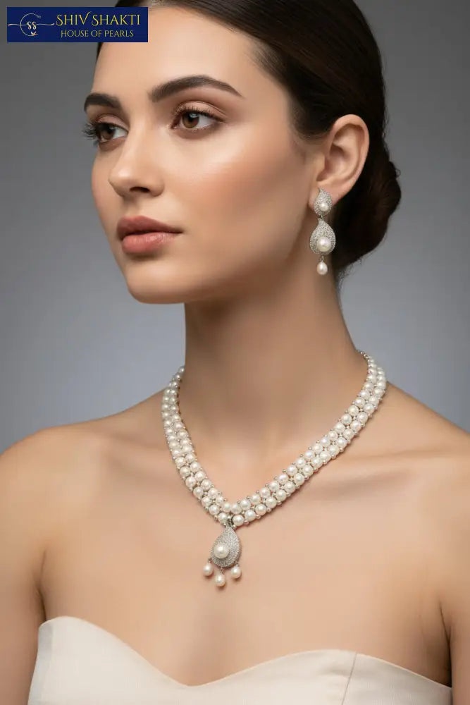 Shiv Shakti Pearls - 2 line Button Radiance