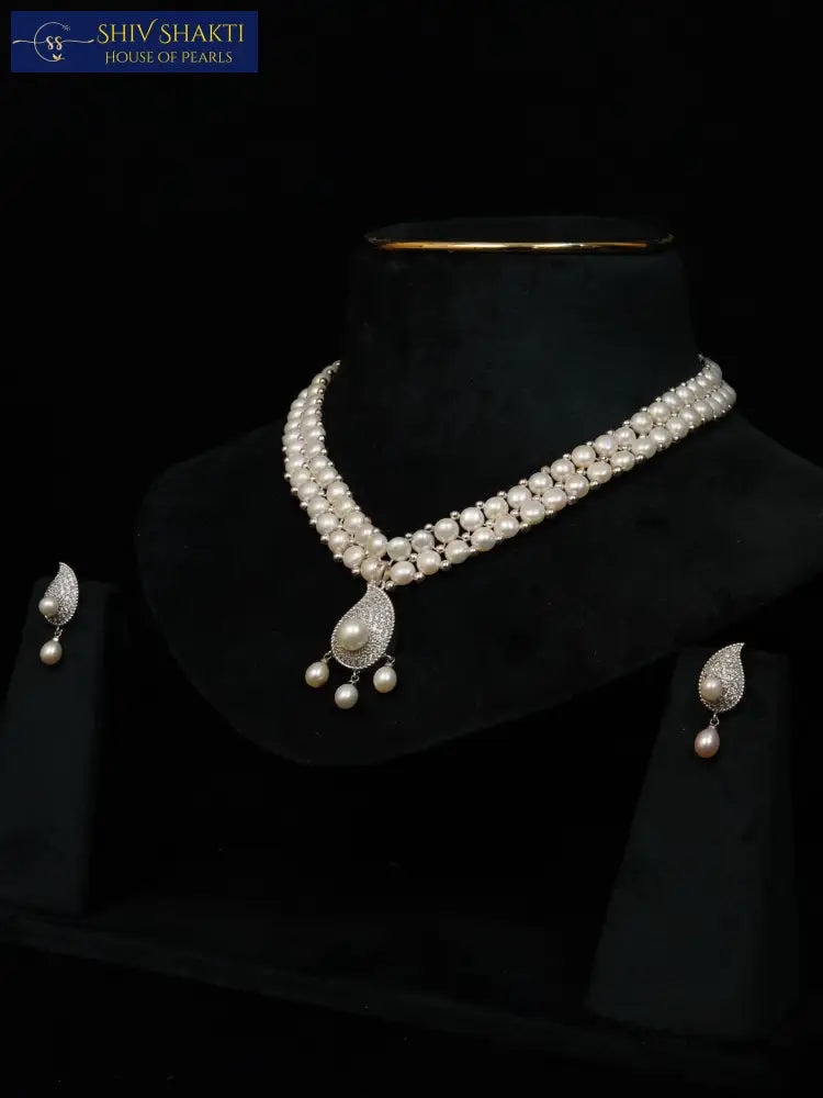 Shiv Shakti Pearls - 2 line Button Radiance