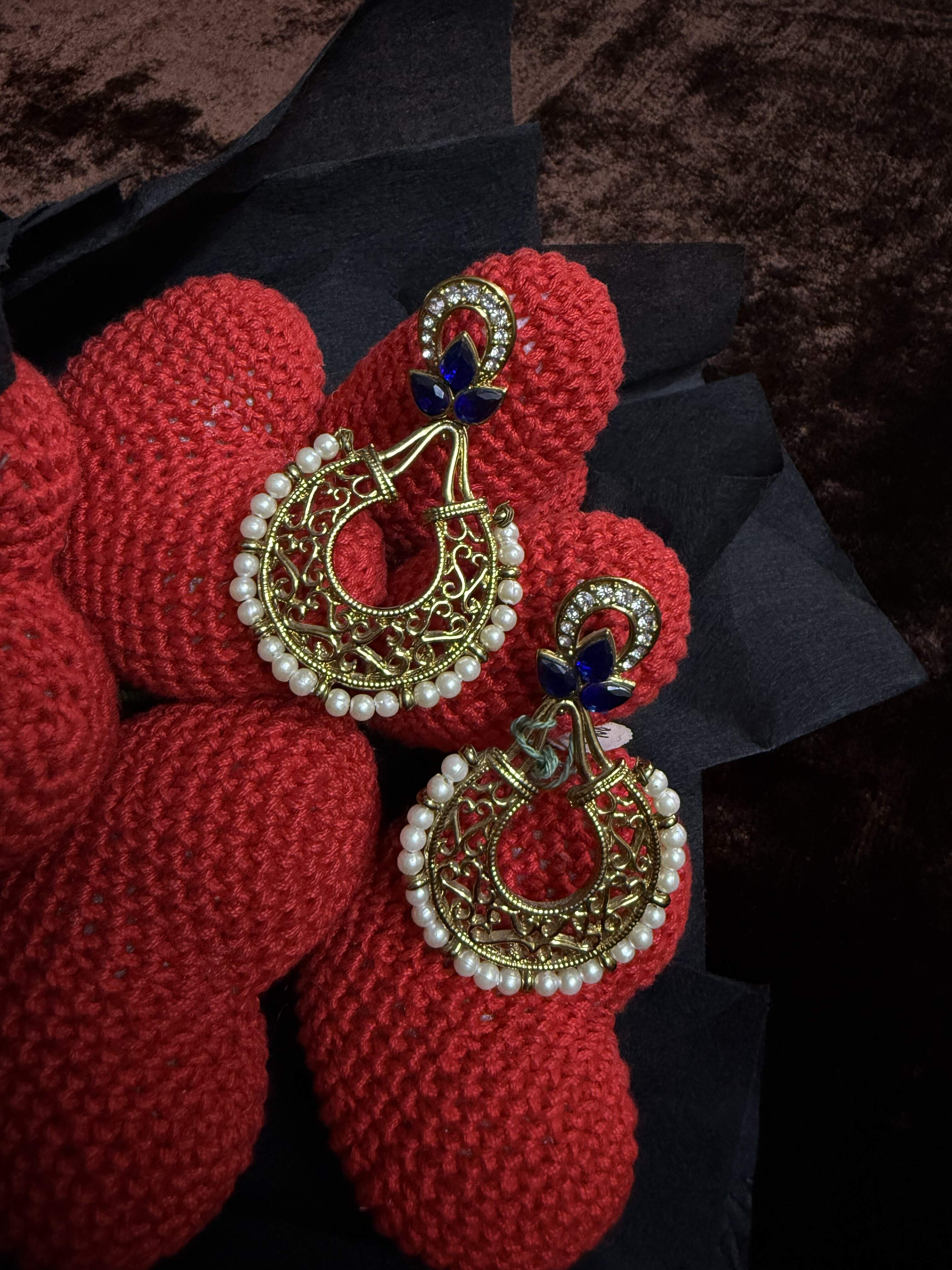 Golden polished blue stoned earring
