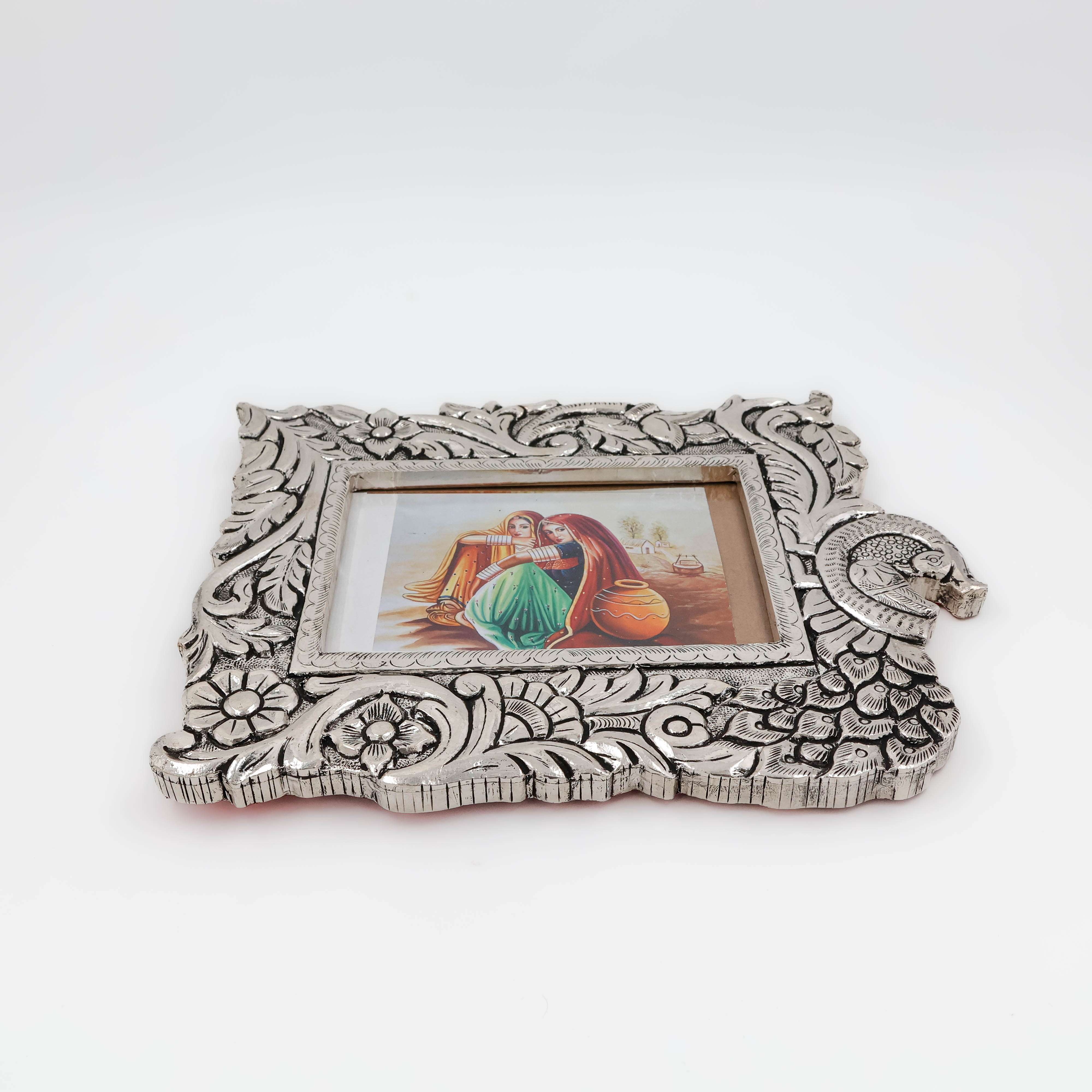 Suraj Bhan Jewellery Hub - Elegant Silver Peacock Frame