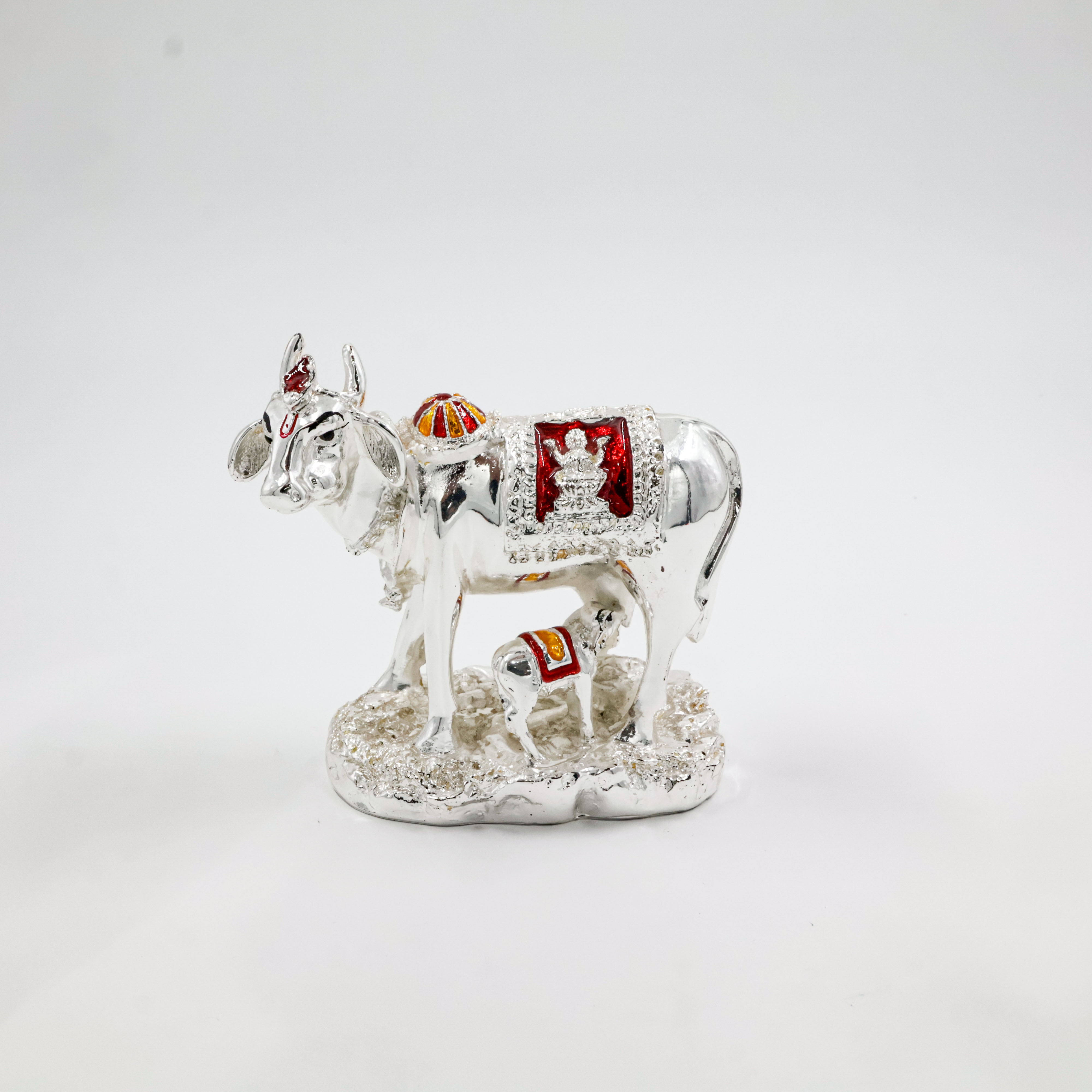 Silver Coated Cow With Calf