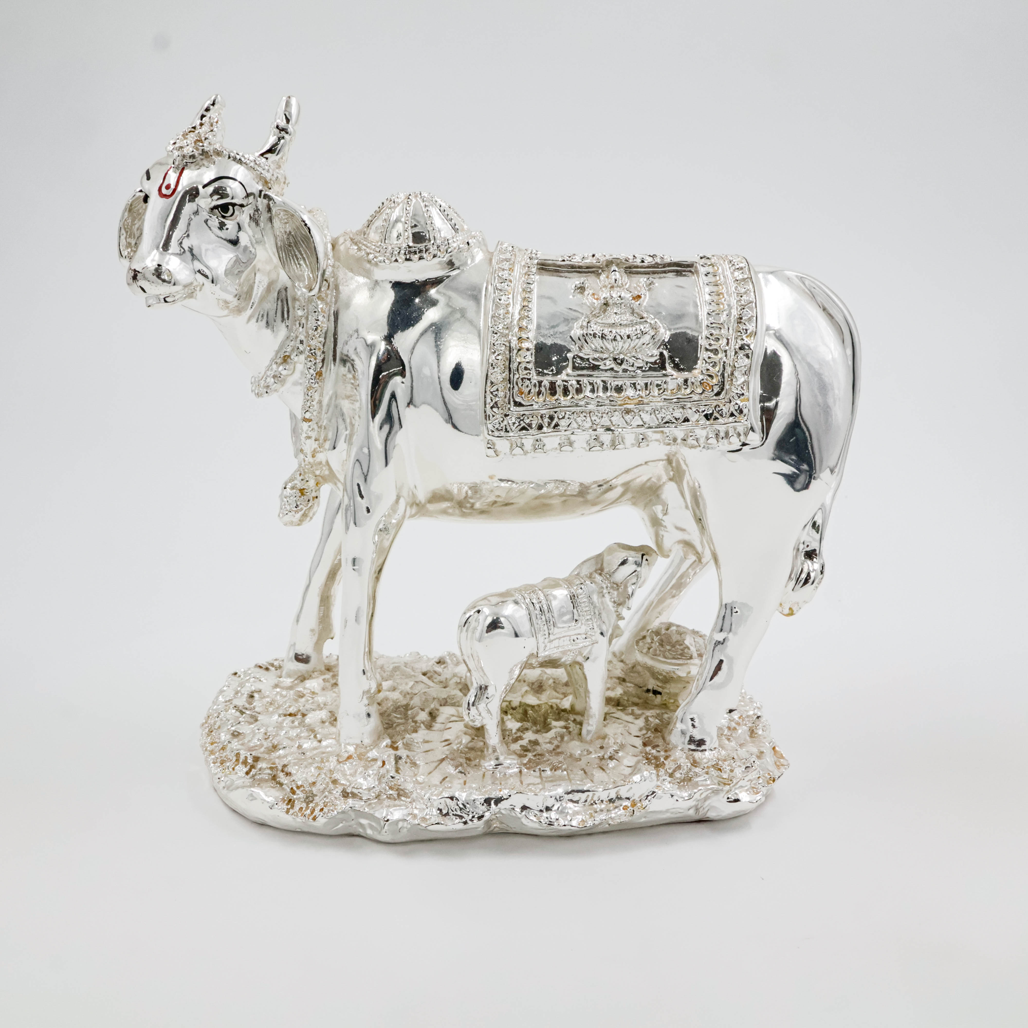 Silver Coated Cow With Calf