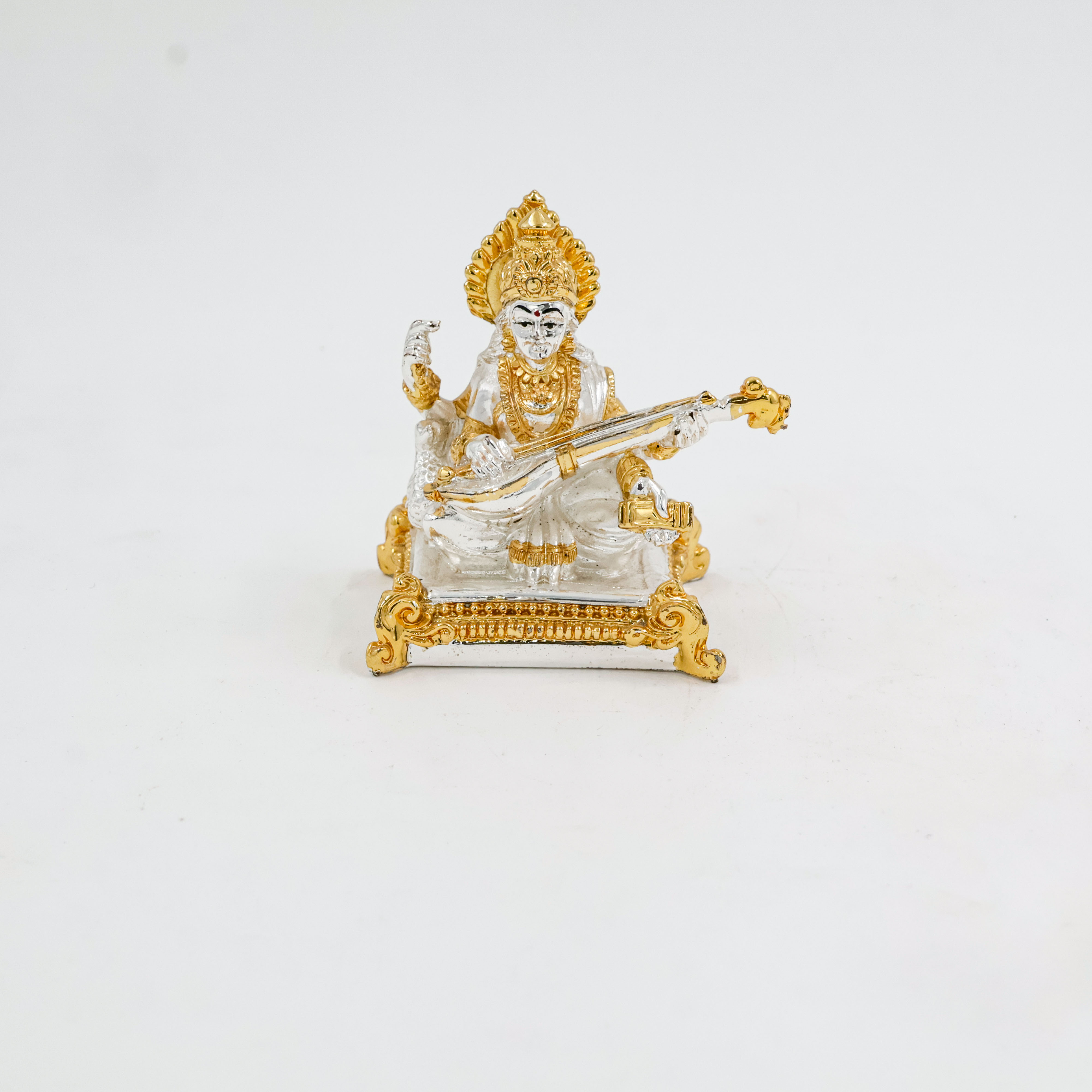 Silver Coated Saraswati Idol With Gold Design